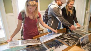 history students looking at artifacts