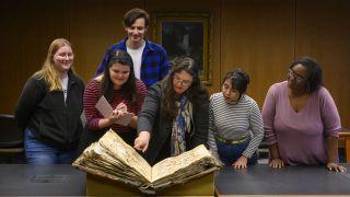 music history professor and students in library