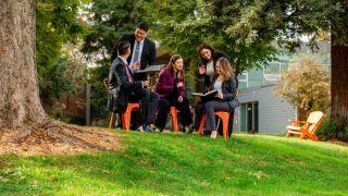 group of students studying on campus